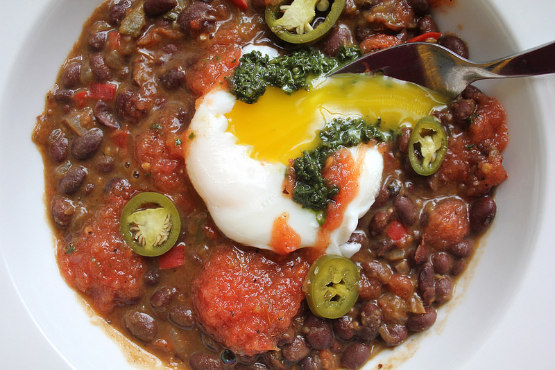 Black Beans with Salsa Roja, Kale Salsa Verde, and a Poached Egg